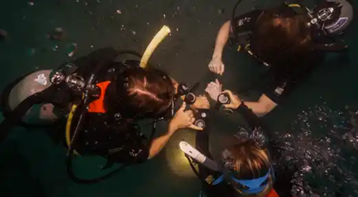 SSI Advanced Open Water students practising underwater skills during a training dive with Echo Divers Koh Tao.