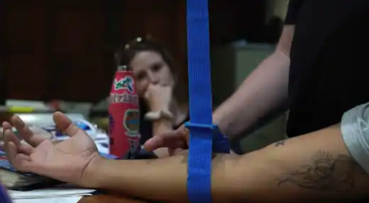 Student practising first aid techniques during the SSI React Right course at Echo Divers Koh Tao.