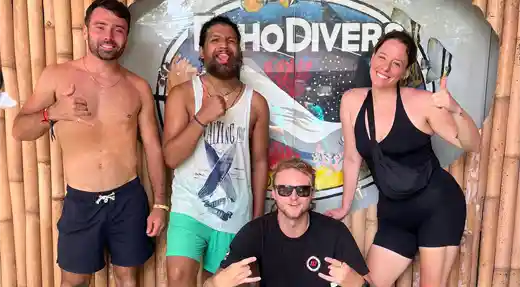 Group of smiling SSI Deep Specialty students posing at Echo Divers Koh Tao after completing their training.