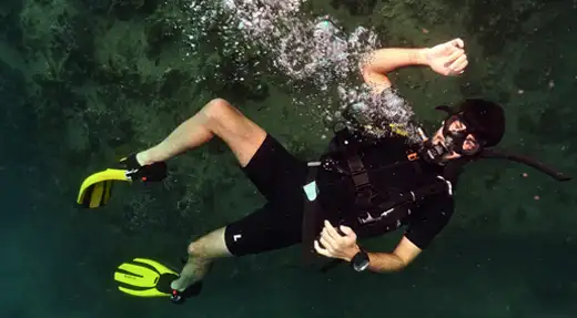 A diver practising controlled breathing and buoyancy during the SSI Enriched Air Nitrox specialty course with Echo Divers Koh Tao.